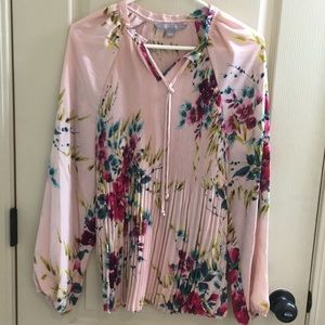 Dressy pleated floral blouse